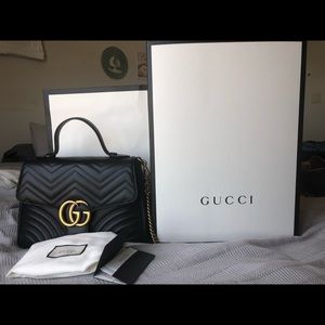 Gucci Marmont medium top handle bag.